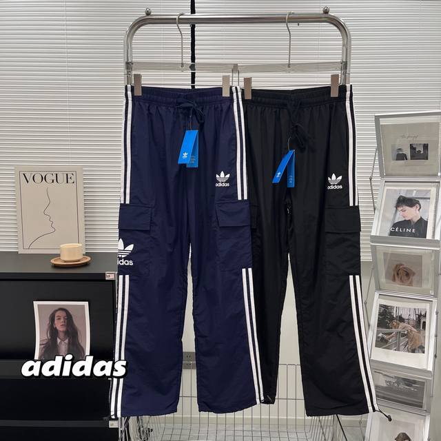 阿迪达斯 Adidas三叶草 2024新款工装裤春秋潮宽松直筒休闲裤潮流阔腿限量冲锋裤工装裤户外大口袋机能风情侣休闲裤 出行必备可盐可甜。 工装裤是近几年衣柜里