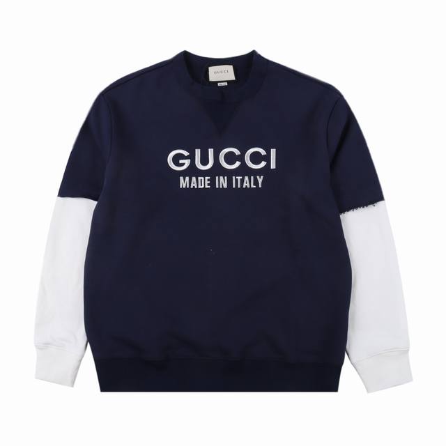 Gucci 古驰 24Fw 刺绣字母logo拼接假两件卫衣 从富有凉爽季节气息的色彩和纹理中汲取灵感，这款休闲棉质卫衣于胸前点缀刺绣logo，以及袖口的做旧拼接